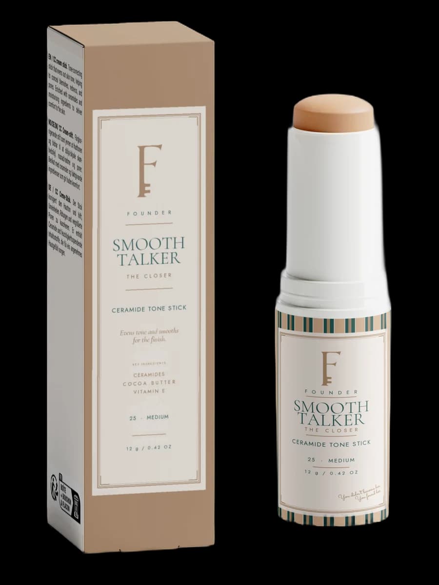 Smooth Talker ceramide tone stick beside its brass carton.
